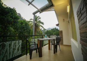 Munnar Mountain Cottages By Lexstays